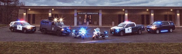 Police vehicles in front of the department